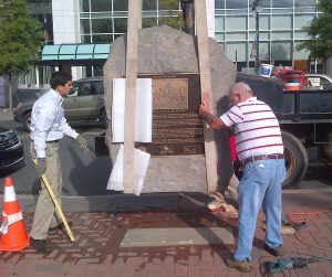 Installation of the Battle of Charlotte marker. Photo by author.