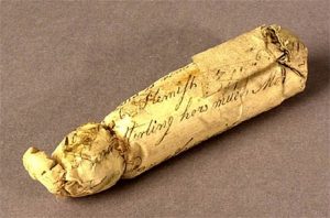 Typical musket cartridge. Approximately 3.5 inches long. Photo courtesy of The George C. Neumann Collection, Valley Forge National Historical Park, VAFO 928.
