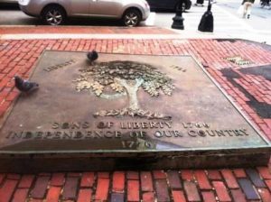 Liberty Tree plaque on street near motor vehicle building (Boston Parks).
