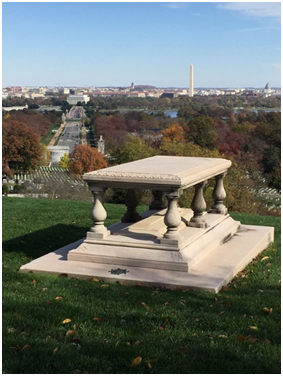 Figure 2 - Pierre Charles L'Enfant's grave overlooking the city he designed. On the top of the marker is an early map of the District of Columbia city plan. (Photo by author)