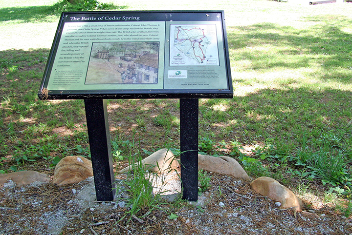 The legend on the newly placed interpretative marker reads: ”The Battle of Cedar Spring. In early July 1780, a small force of Patriot militia under Colonel John Thomas, Jr. gathered near Cedar Spring. When news of the camp reached the British, they planned to attack them in a night time raid. The British plan of attack, however, was discovered by Colonel Thomas’ mother, Jane, who alerted her son. Colonel Thomas and his men waited in ambush on July 12 in the woods near their camp, and when the British attacked, they opened fire, killing and wounding many of the British while the survivors scattered in confusion.” This is all that remains to remind us of this once remarkable place. Even the name – Cedar Spring vs Cedar Springs—has become muddled. The author questions much of what now is printed on this sign. (Photo by author)